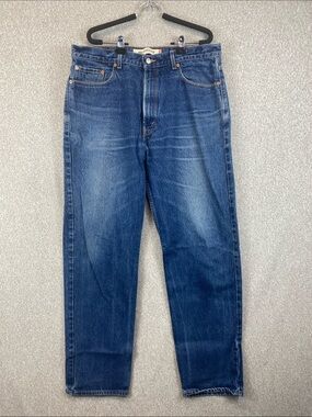 Levi’s 550 vintage relaxed fit all cotton thick heavy denim 38x34 cut date 2005
